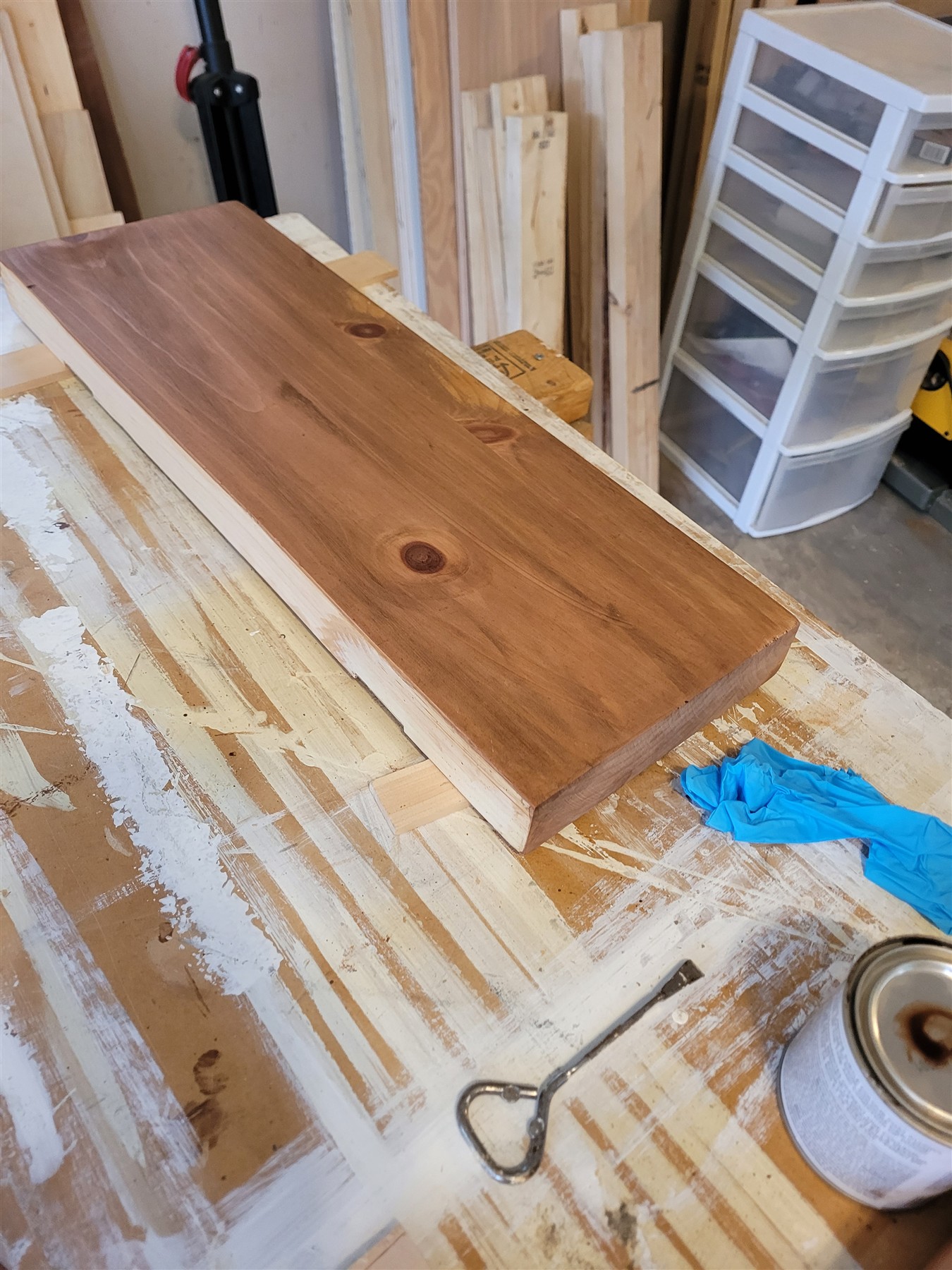 Close view of one refinished floating shelf in development